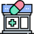 Pharmaceuticals Open laptop displaying a medical cross on screen with a two-tone pill hovering above, representing online pharmacy or telemedicine.